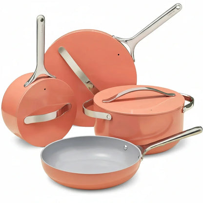 Coral nonstick cookware set with stainless steel handles, perfect for everyday cooking and kitchen organization