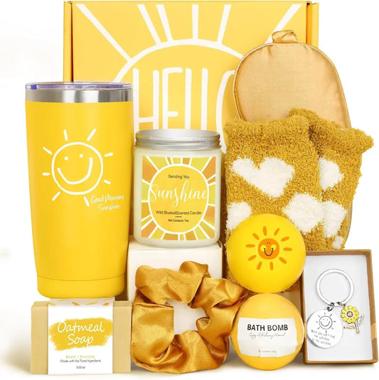 Sunshine-themed gift set with yellow tumbler, scented candle, bath bomb, oatmeal soap, and cozy socks
