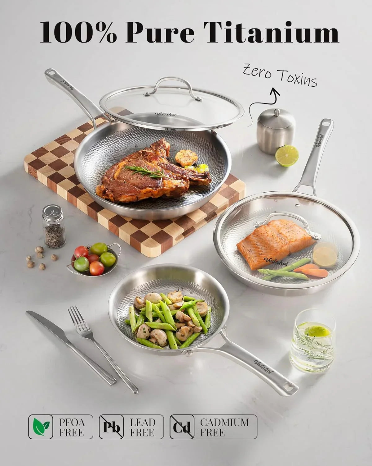 Pure titanium cookware set with steak, salmon, and veggies, non-toxic and PFOA-free for healthy cooking