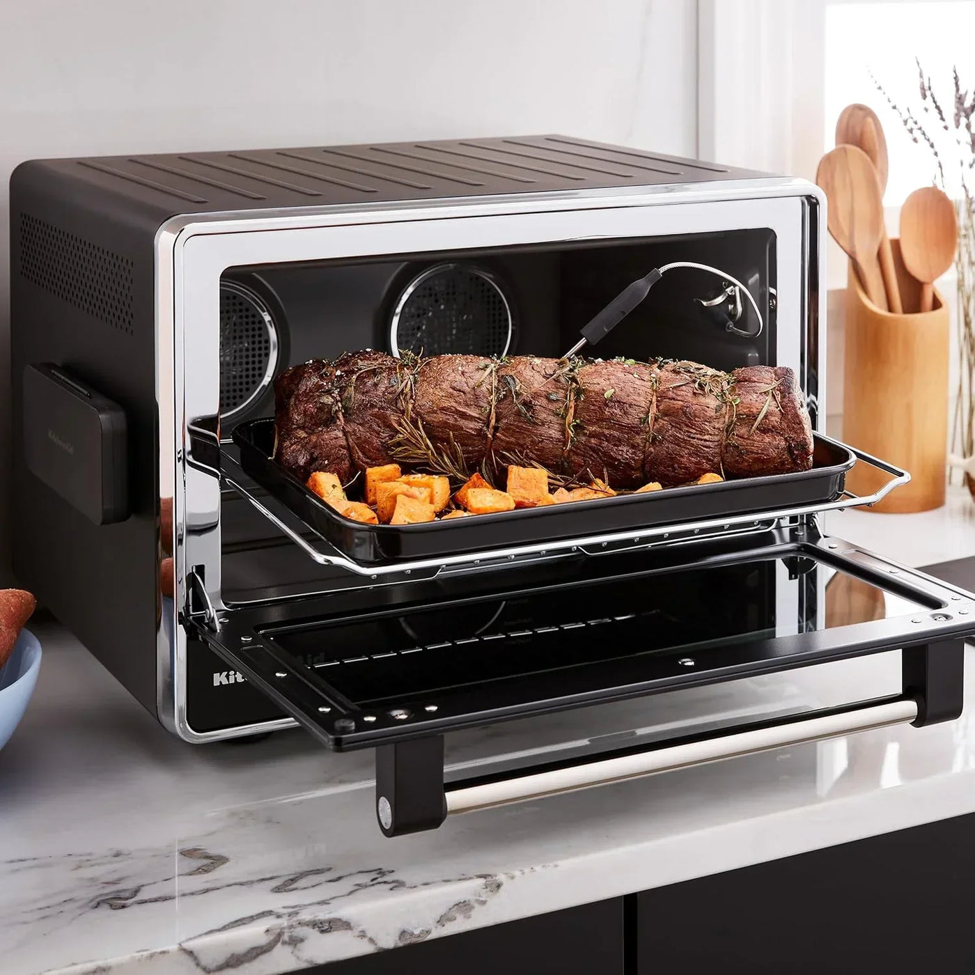 KitchenAid countertop oven roasting beef tenderloin with sweet potatoes, herbs, and digital probe thermometer